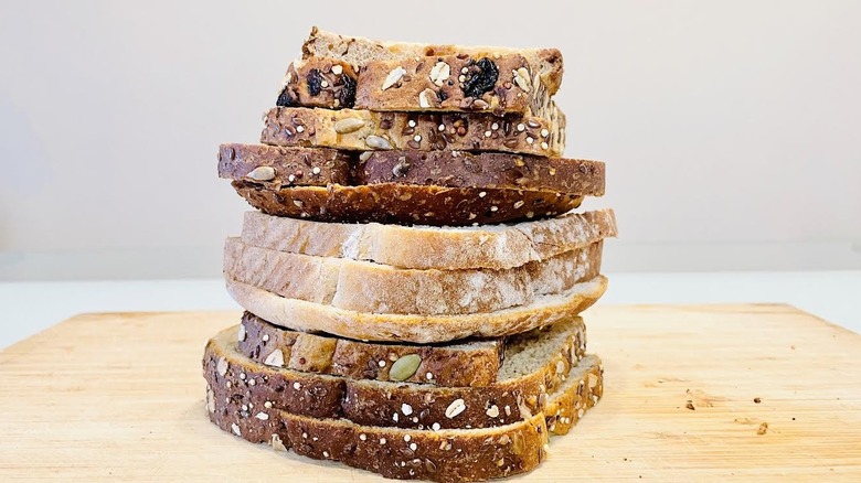 Stack of various types of Dave's Killer Bread