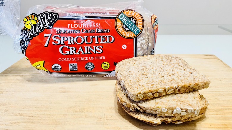 Loaf of Ezekiel Sprouted Grains Bread with slices on side