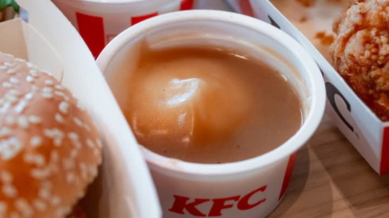 Closeup of KFC mashed potatoes with gravy between meals