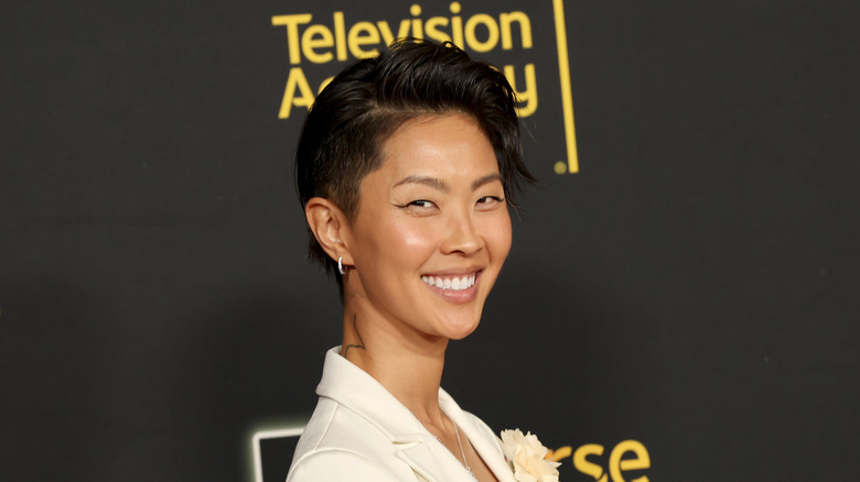 Kristen Kish walking a red carpet