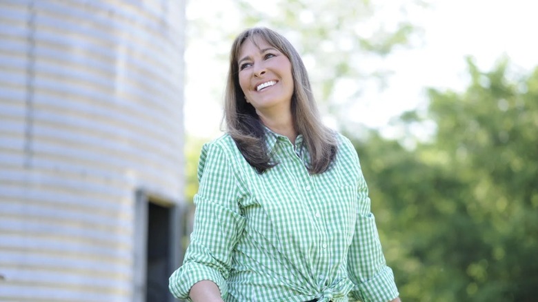 Melissa Cookston wearing a green and white button up shirt outdoors