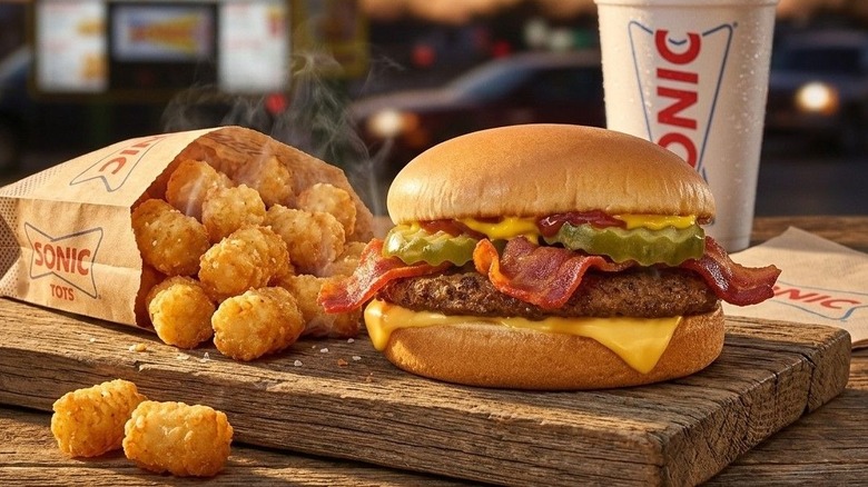 A Jr Bacon Cheeseburger and a side of tots from Sonic.