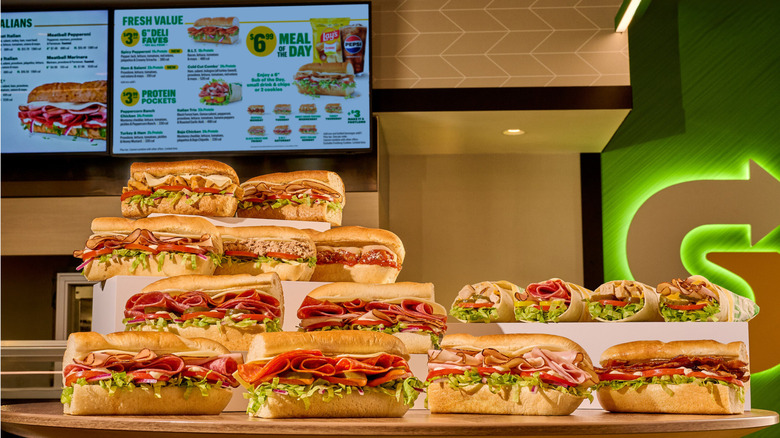 Subway's value menu items on a a counter in the store.