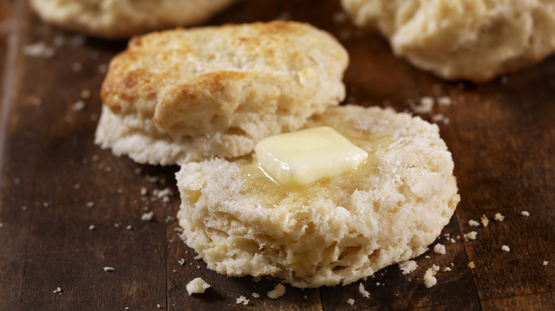 A cut biscuit with tab of melting butter