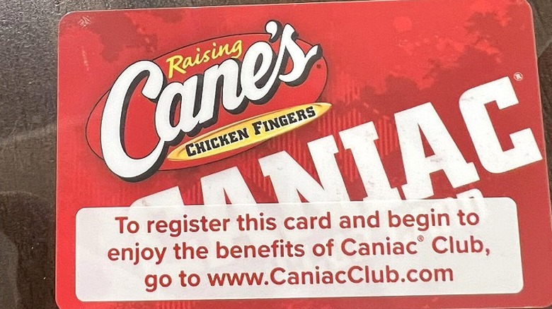 Closeup of a Raising Cane's Caniac Club card