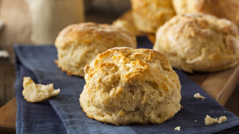 buttermilk biscuits on a blue kitchen towel