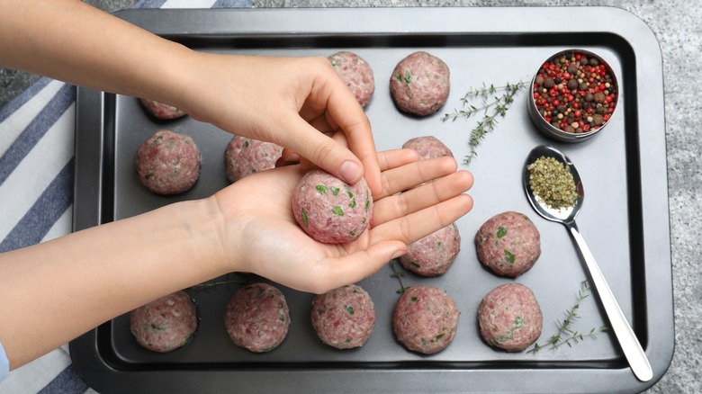 Making homemade meatballs