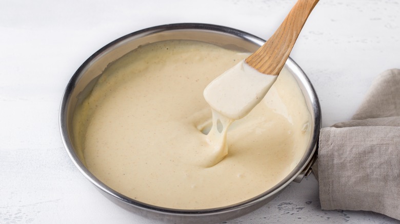 Béchamel sauce in pan