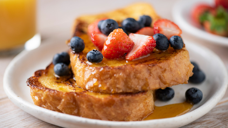 French toast with berries and maple syrup