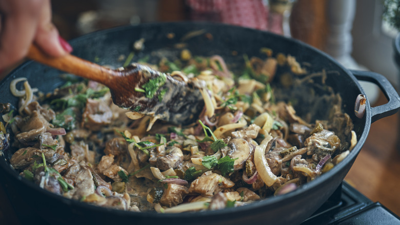 chef cooking vegan stroganoff