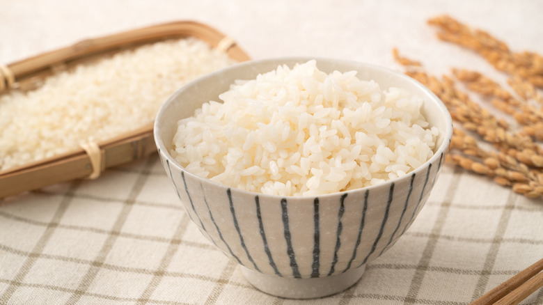 A bowl of white rice pictured.