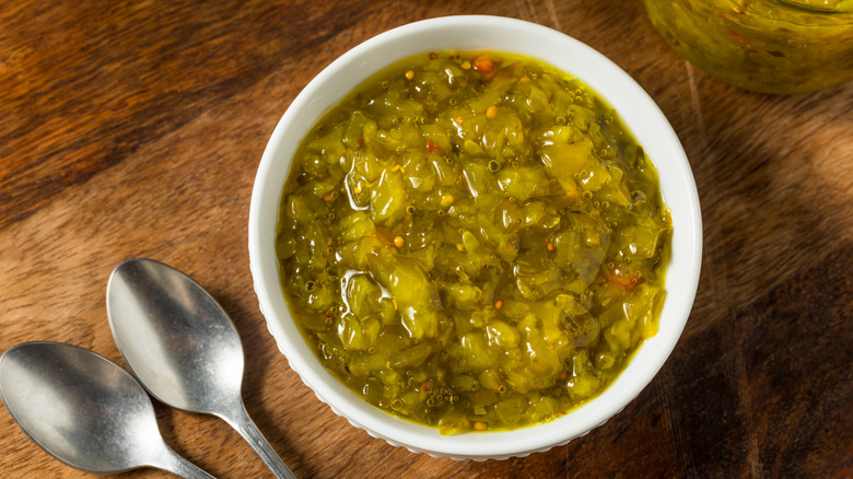 Sweet pickle relish in a small white bowl.