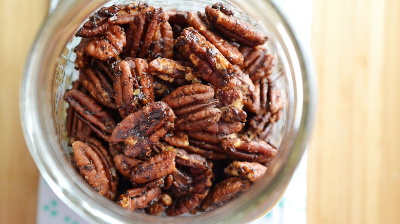 A jar of maple pecans