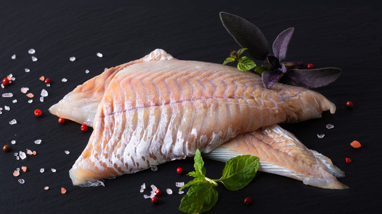 Raw Alaska pollock filets.