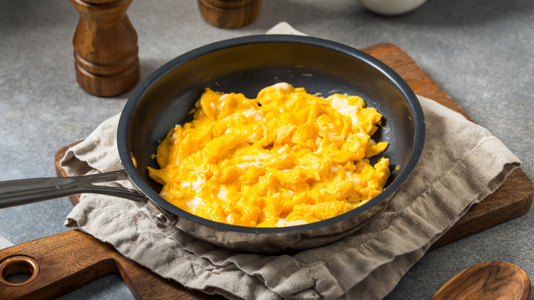 A pan of scrambled eggs.