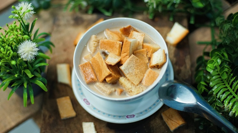 Milk soup topped with bread