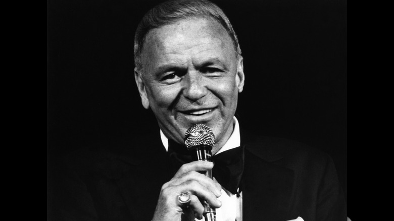 a black and white photo of frank sinatra