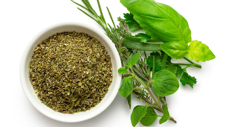 Fresh and dried herbs white background