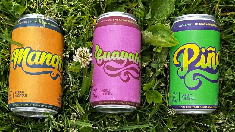 Cans of mango, guava, and pineapple flavored Fresco Naturales