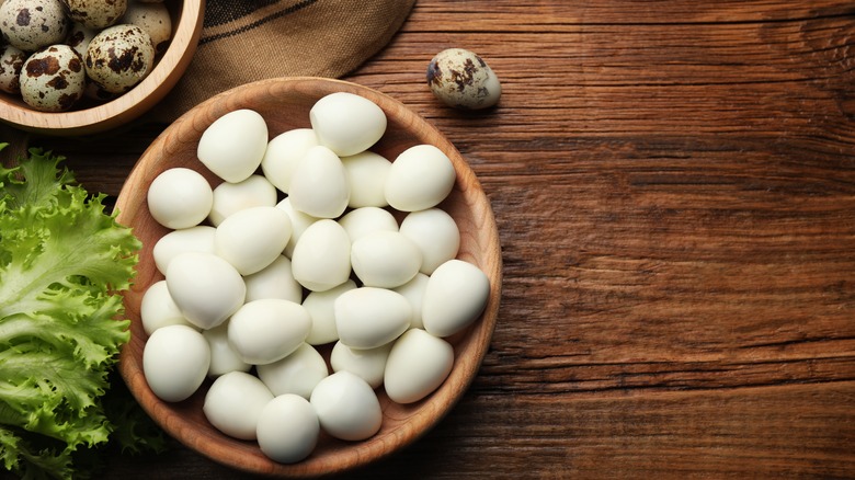 quail eggs on a wooden table