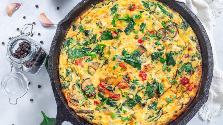 A frittata with lots of vegetable fillings