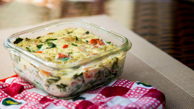 A frittata in a glass storage container