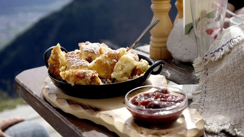German kaiserschmarrn with jam on an outdoor table