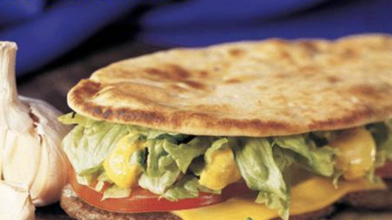 McAfrika sandwich next to fresh garlic