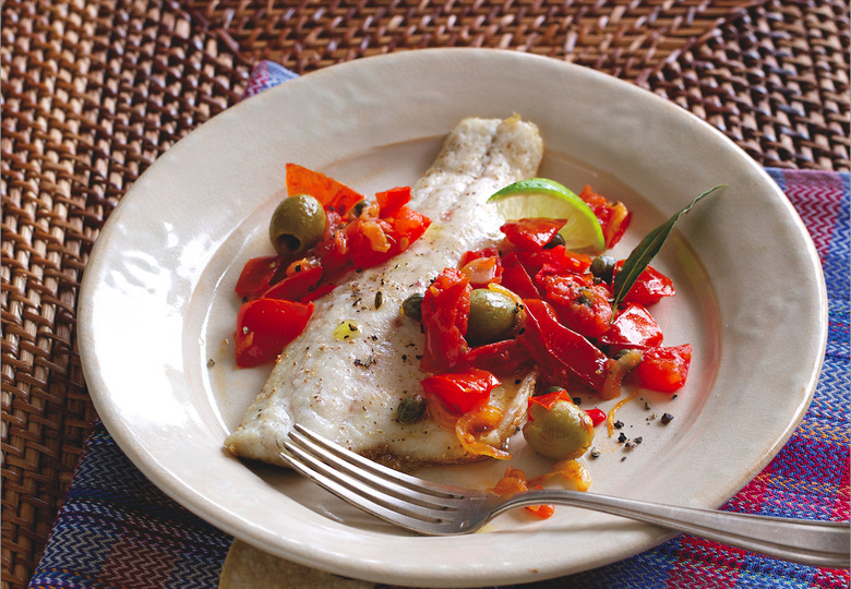 Expand your culinary horizons with a Veracruzana preparation of sea bass, marinated in lime juice and baked in a sauce of tomatoes, olives and capers.