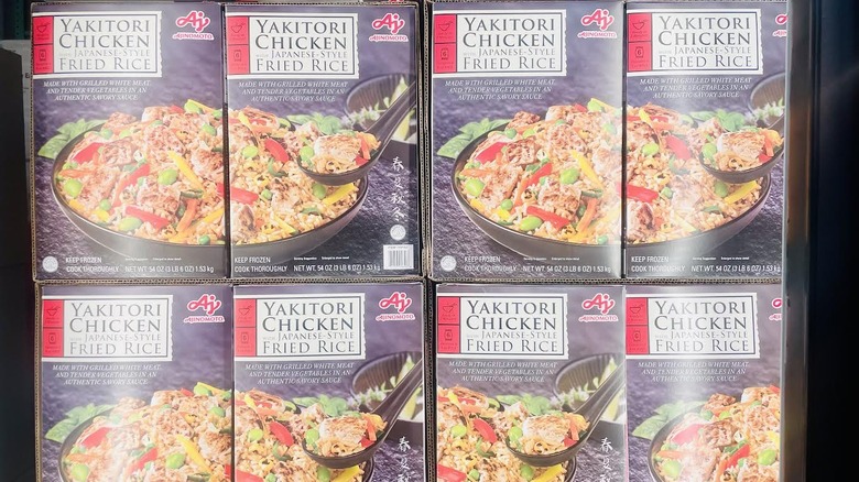 Boxes of Ajinomoto Yakitori Chicken Fried Rice lined up on store shelf