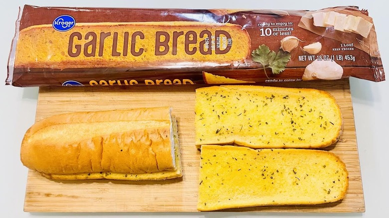 Cooked loaf of Kroger Garlic Bread with opened packaging