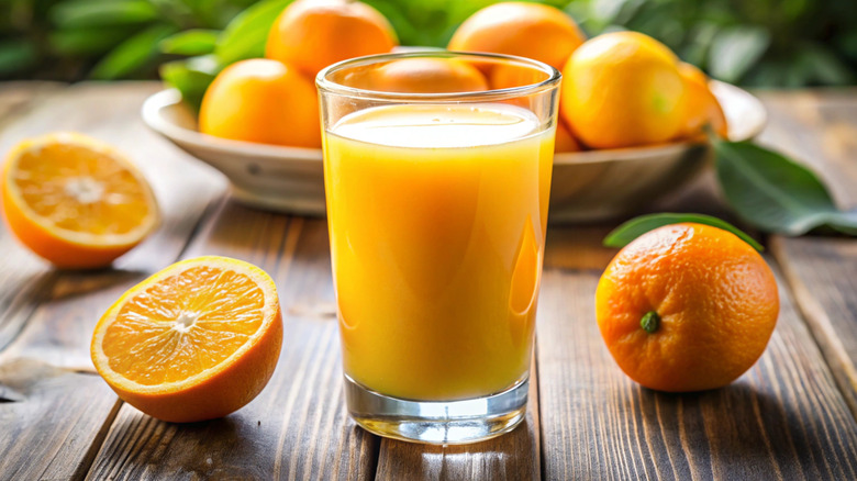 A glass of orange juice.
