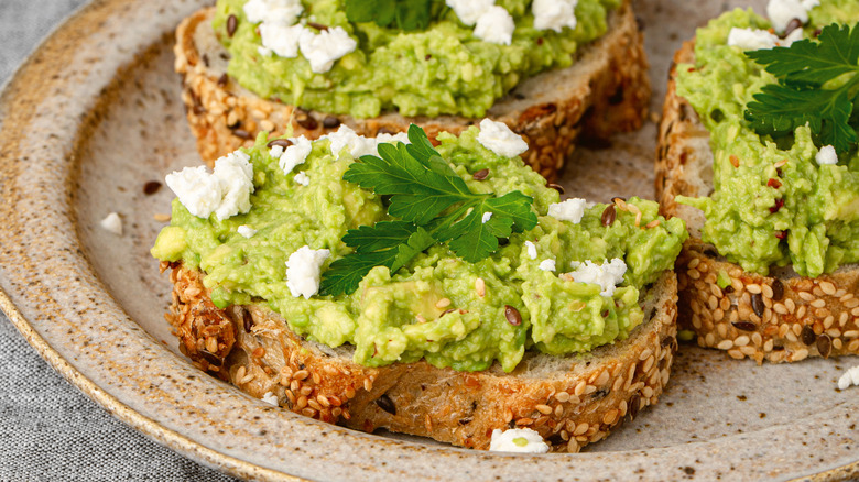 avocado toast with cheese on top