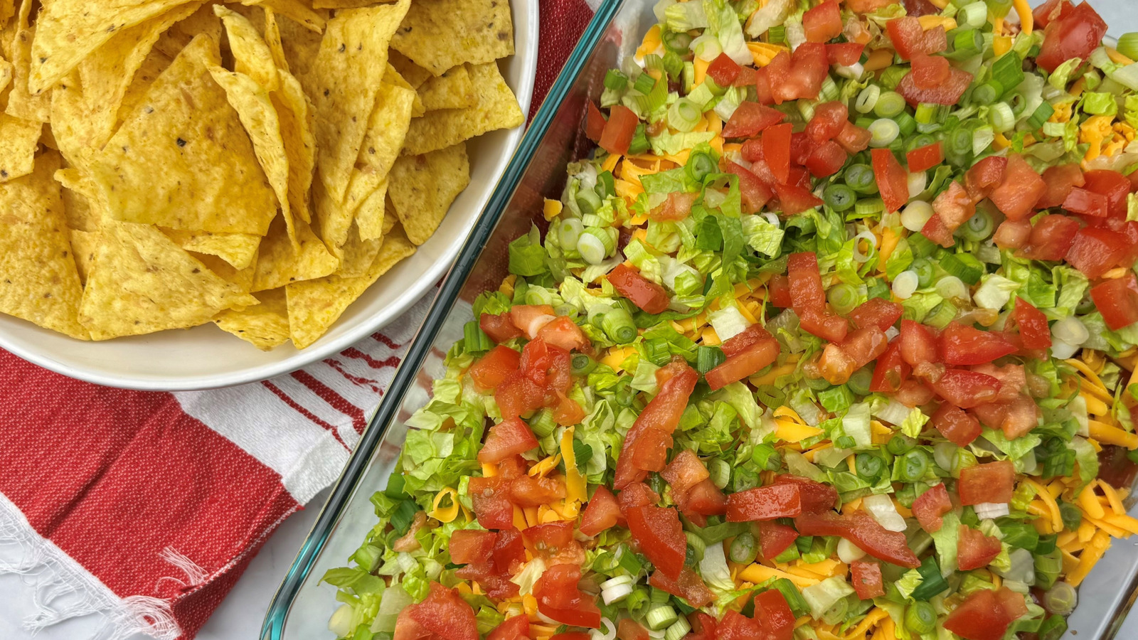 <a href="https://www.foodrepublic.com/1774681/loaded-taco-dip-recipe/" target="_blank">Game Day Loaded Taco Dip Recipe</a>