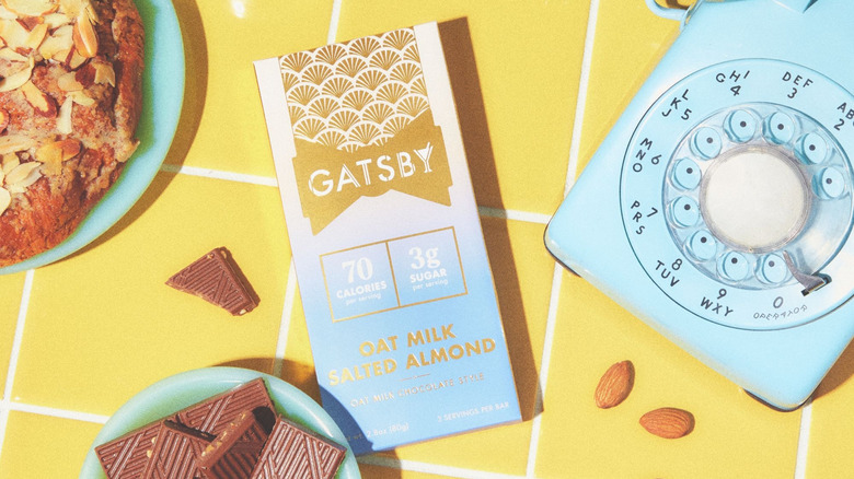Oat Milk Salted Almond Gatsby bar on yellow tiles