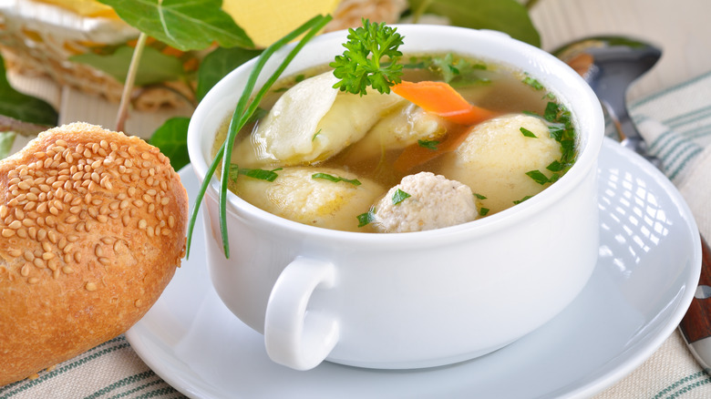 German wedding soup with herbs and bread
