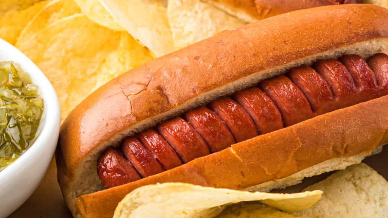 A hot dog cooked in the air fryer with slits cut into it