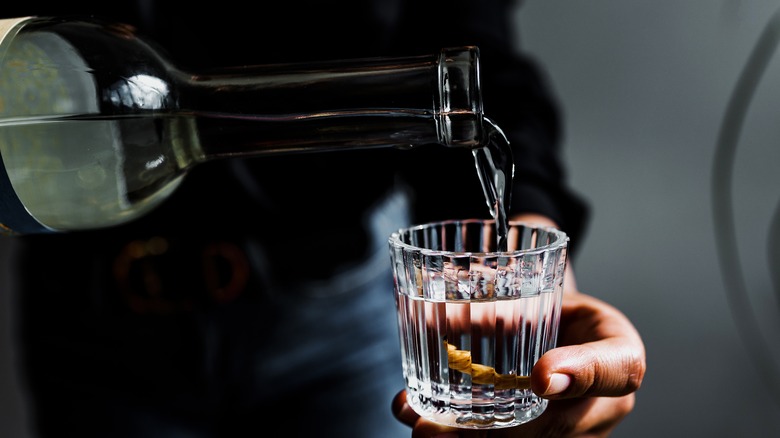 pouring out mezcal