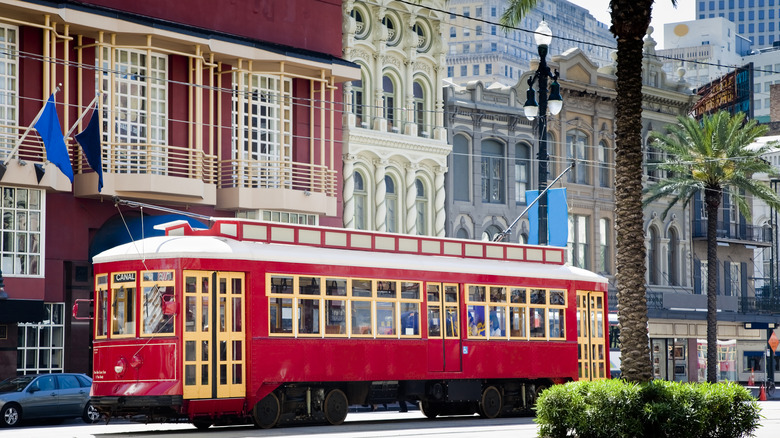 a streetcar travelling through downtown NOLA