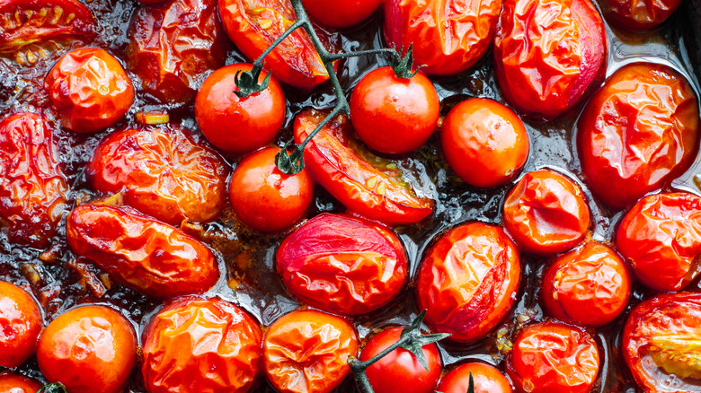 roasted tomatoes on a sheet pan