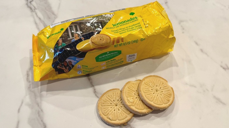 Three Lemonades cookies in front of package on counter