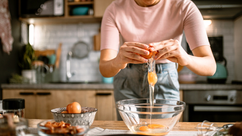 Eggs cracked into a bowl.