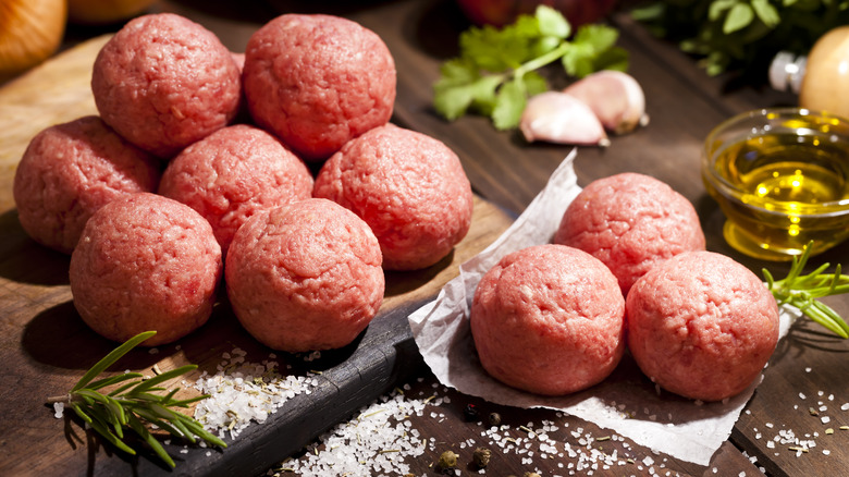 Raw meatballs with seasoning