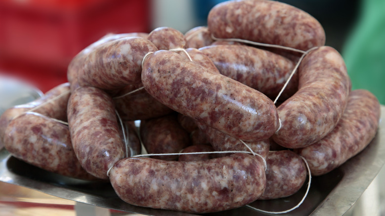 Stack of Italian sausages at farmers market