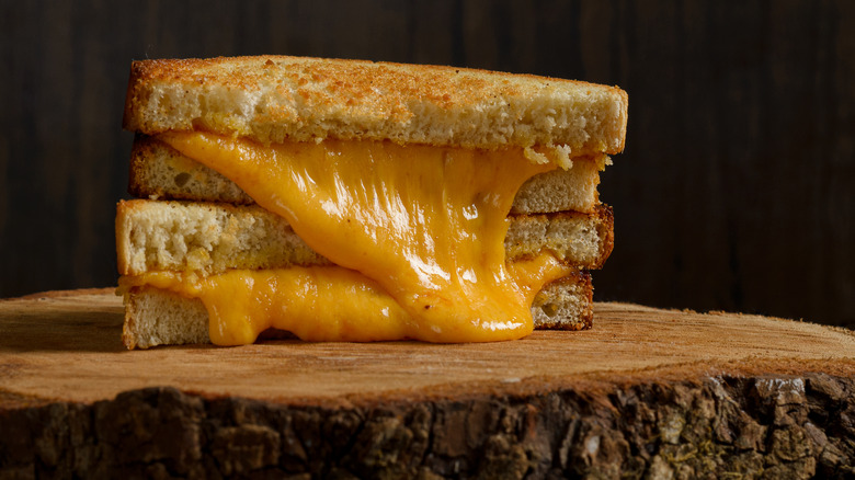 Grilled cheese on a wooden plate