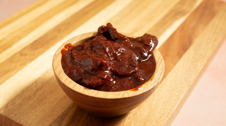 A bowl of chipotle peppers in adobo marinade.