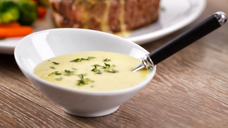 A small bowl of béarnaise sauce.