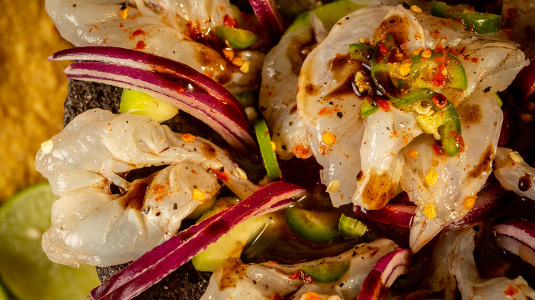A plate of aguachile with shrimp.