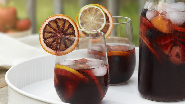 two glasses and pitcher of sangria