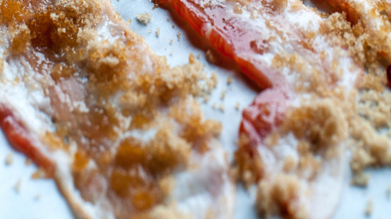 strips of bacon sprinkled with light brown sugar